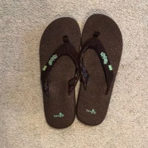 New Woman’s Sanuk Flip Flops
